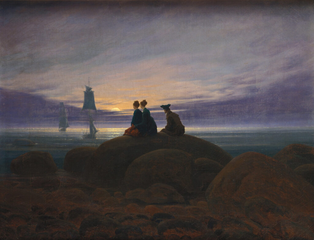 People looking at the sunset